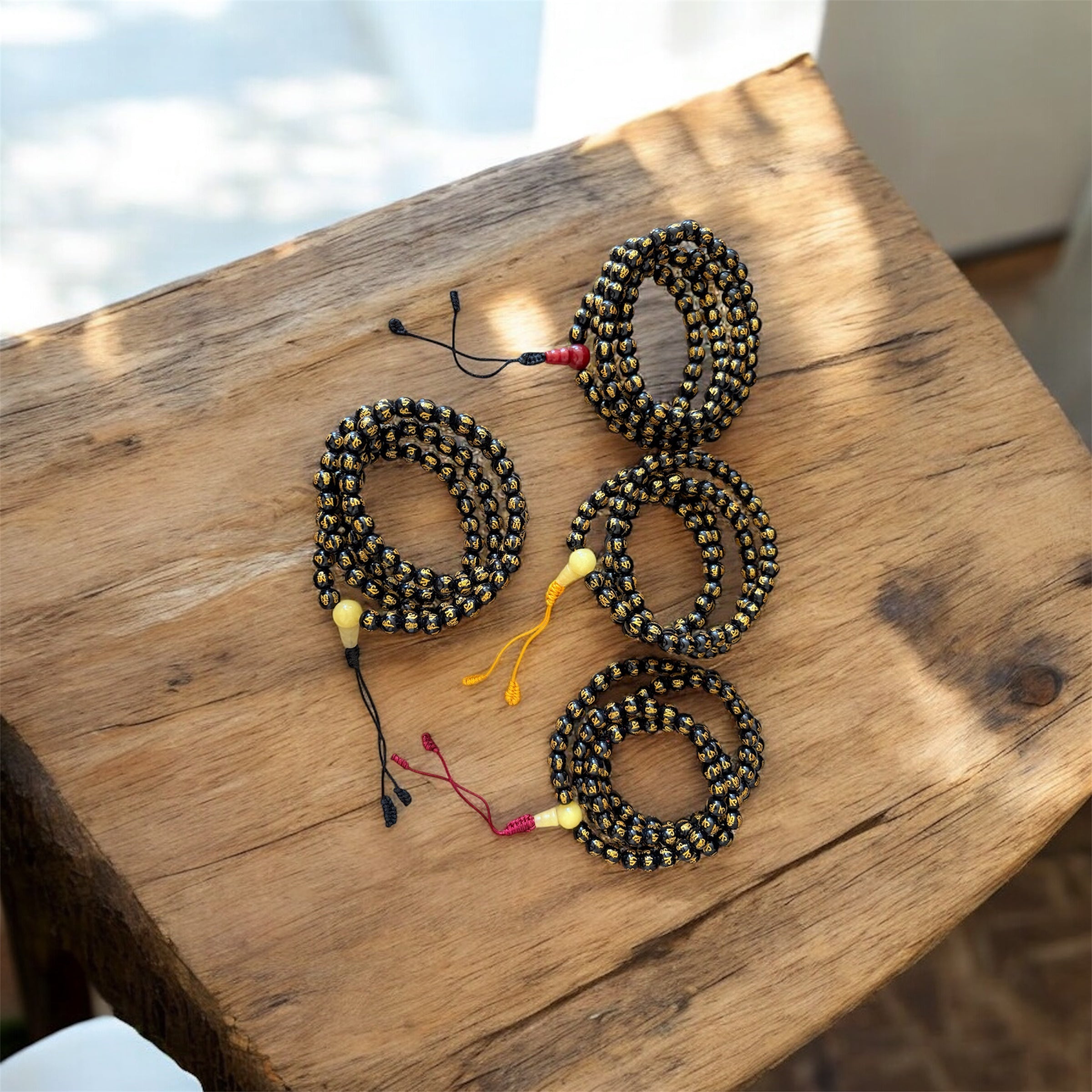 Om Mani Padme Hung carved Black Agate Mala