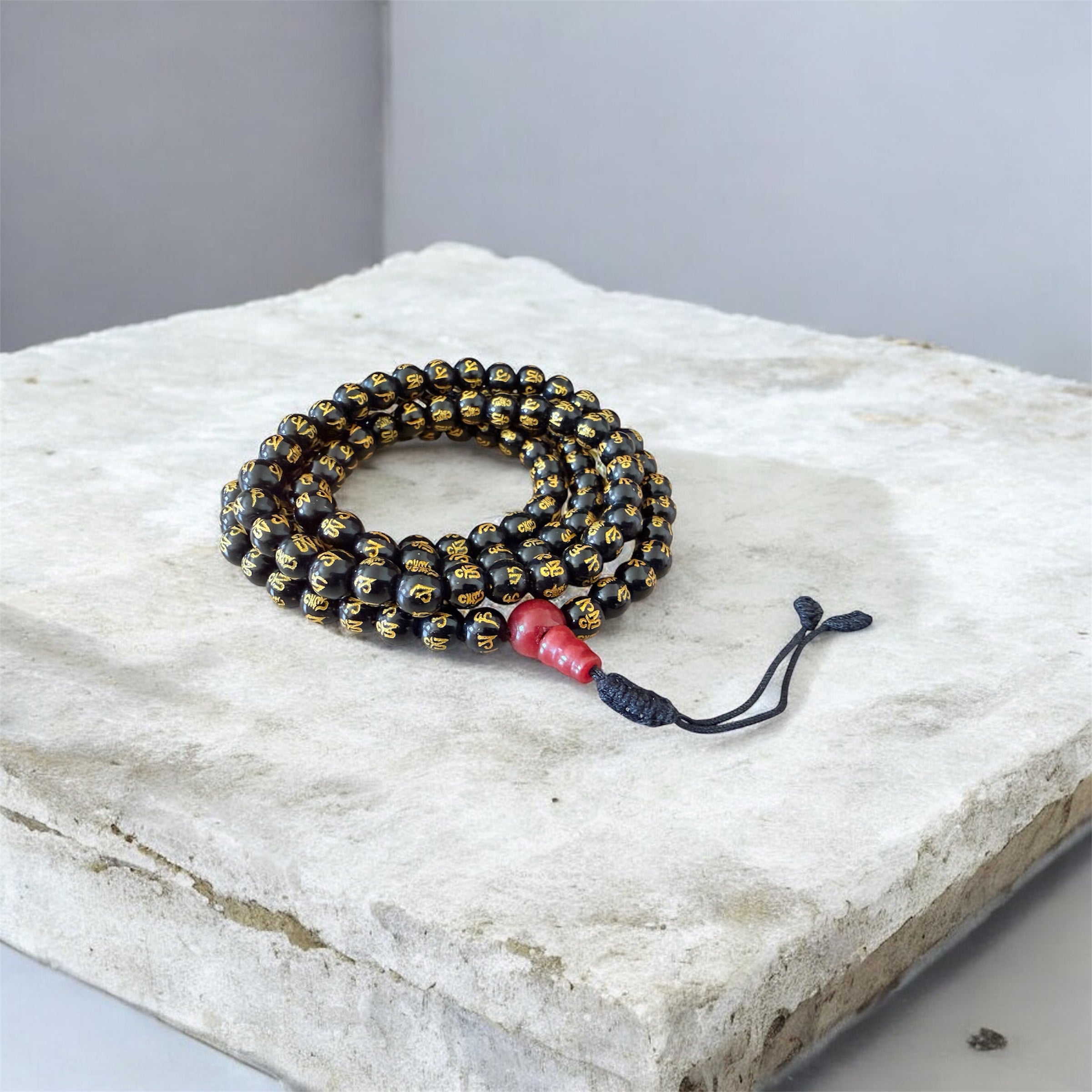 Om Mani Padme Hung carved Black Agate Mala