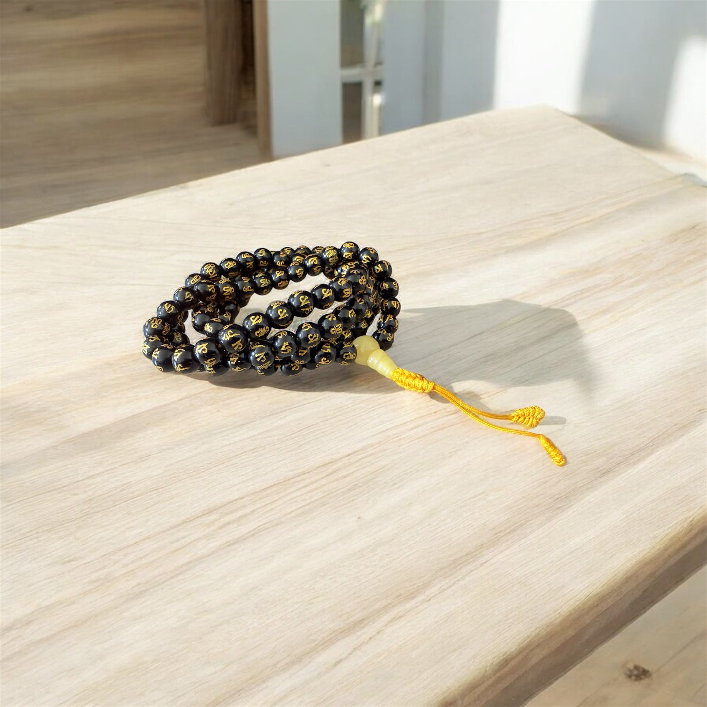 Om Mani Padme Hung carved Black Agate Mala