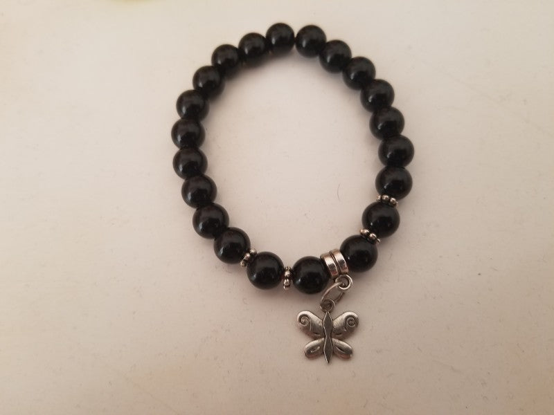 BLACK ONYX WITH BUTTERFLY CHARM BRACELET