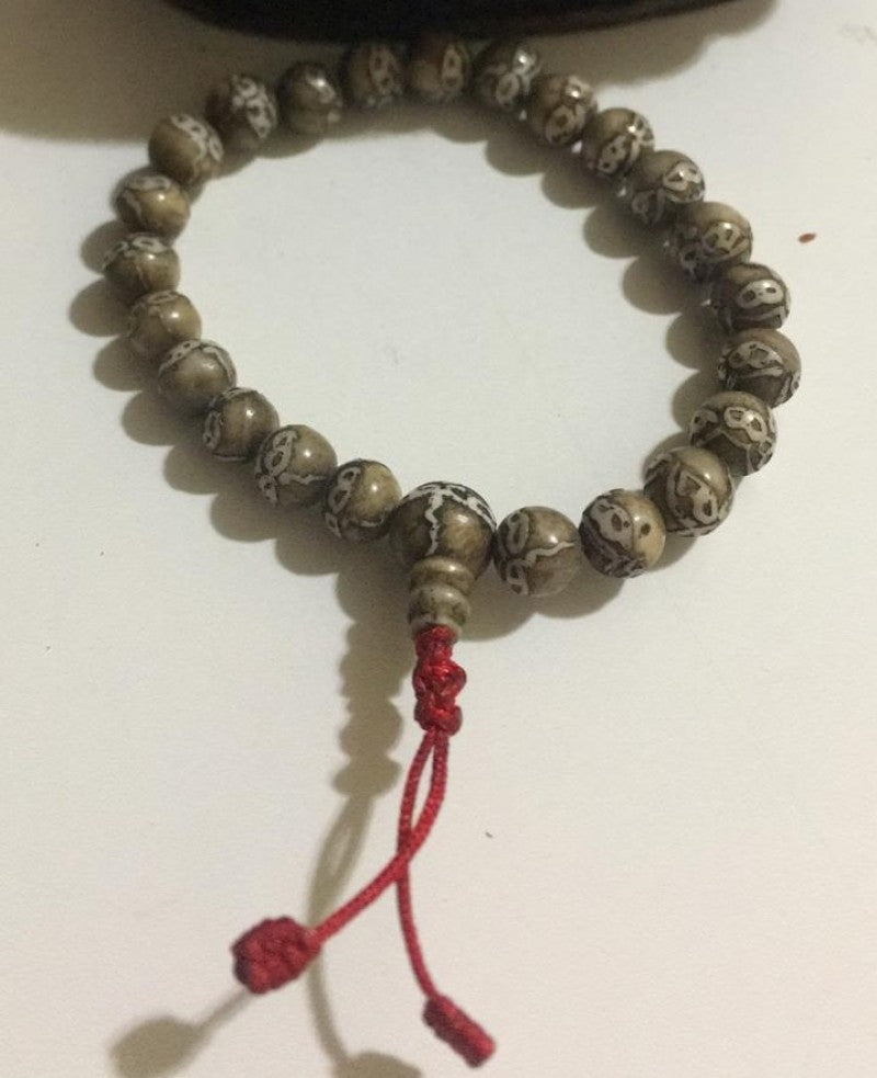 BUDDHA EYE SHELL BRACELET
