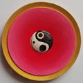 PEACE DESIGN ROUND WOODEN INCENSE BURNER (PINK):-