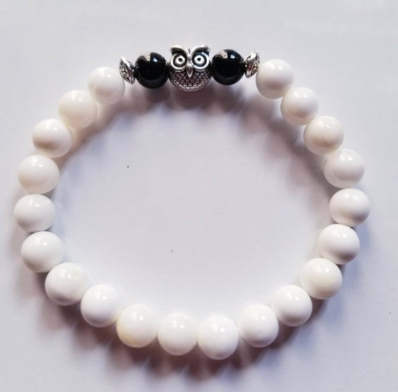 WHITE SHELL WITH OWL CHARM BRACELET