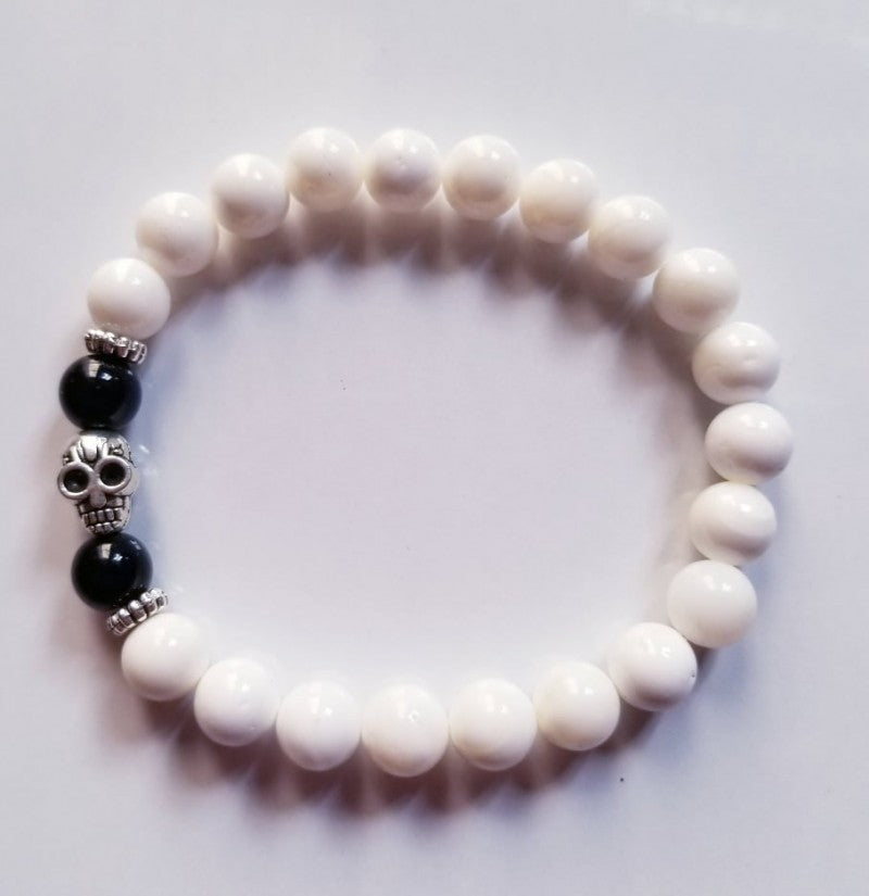 WHITE SHELL  WITH SKULL CHARM BRACELET